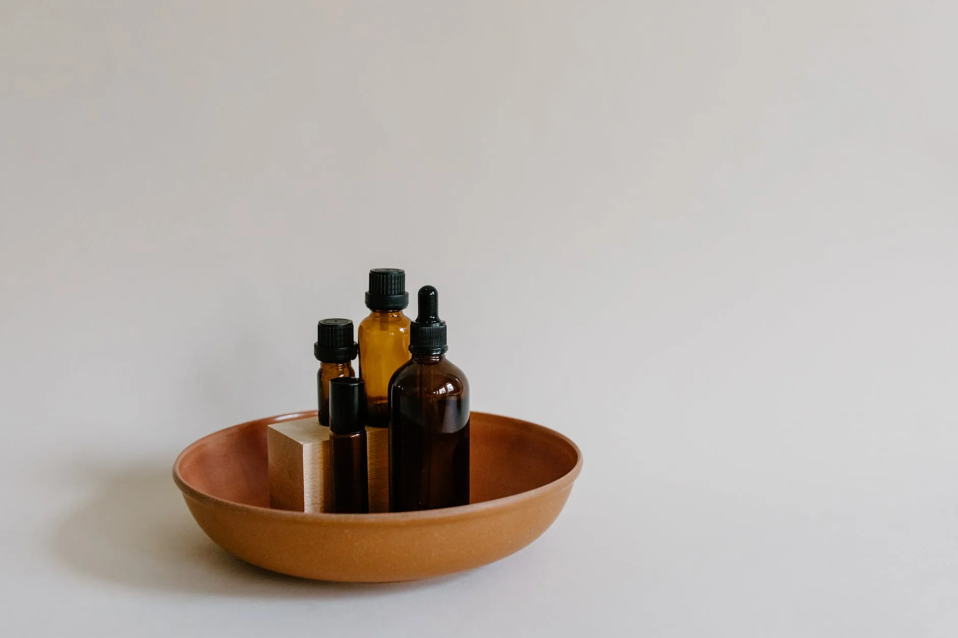 brown bottles on brown bowl
